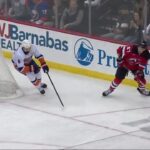 Curtis Lazar scores a goal against the New York Islanders