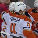 Brock McGinn scores a goal against the New Jersey Devils