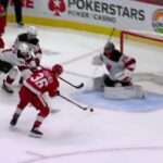 Christian Fischer scores a goal against the New Jersey Devils