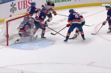 Dawson Mercer scores a goal against the New York Islanders