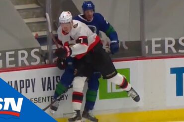 A Pane Of Glass Gets Knocked Out After Brady Tkachuk Hit On Travis Hamonic