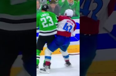 Stars D #23 Esa Lindell Lays Out Avalanche D #42 Josh Manson.