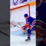 Devils G #40 Akira Schmid stops Oilers LW # Zach Hyman on a breakaway attempt late in the 2nd Pd.