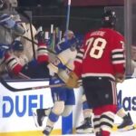 Zach Bolduc sends Taylor Hall FLYING into the Blues bench 😱💪 31.12.2024