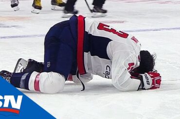 Tom Wilson Helped Off Ice After Being Blindsided By Ryan Reaves