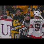 After a collision between Kris Letang and Cole Reinhardt, both teams go at it and Alex Nedeljkovic..