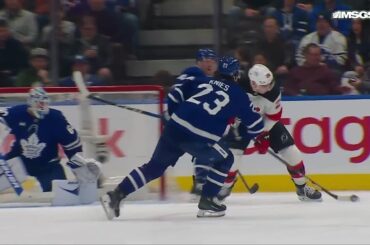 Nico Hischier scores a goal against the Toronto Maple Leafs