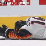 Team Canada defender Braden Schneider gets ejected from game for hit to the head