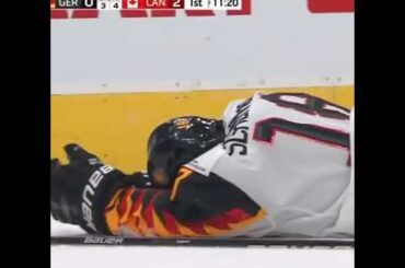 Team Canada defender Braden Schneider gets ejected from game for hit to the head