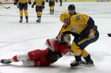 Mark Borowiecki takes down and drags Givani Smith