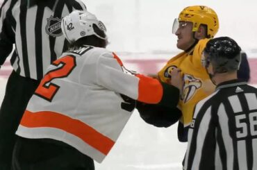 Tanner Jeannot fights Hayden Hodgson in center ice
