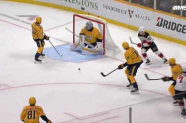 Dougie Hamilton scores a goal against the Nashville Predators