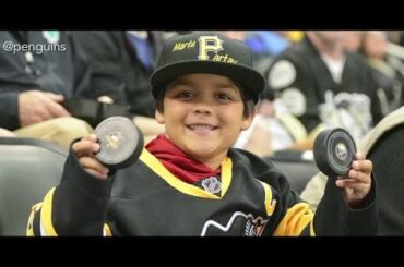 Little Penguins Fan Rewarded After Adult Steals Puck