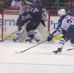 Nikolaj Ehlers scores a goal against the New Jersey Devils