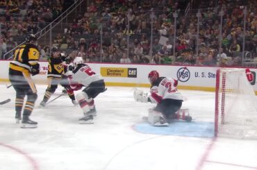 Philip Tomasino scores a goal against the New Jersey Devils