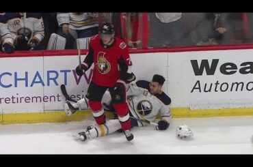 Borowiecki drills Baptiste into boards, Girgensons takes exception