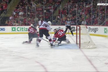 Drake Batherson scores a goal against the New Jersey Devils