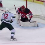Matthew Boldy scores a goal against the New Jersey Devils