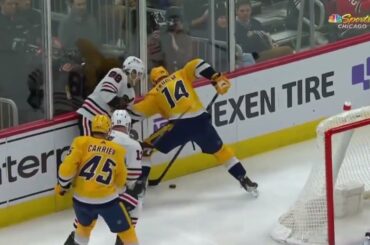 Mattias Ekholm's stick gets wedged into the boards