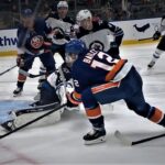 Josh Bailey Chips This One Over The Pad Of Connor Hellebuyck For The 2-1 Lead Early In The Second