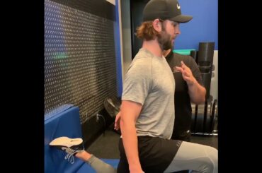 Dr.  Vince working with NHL Goalie Jack Campbell