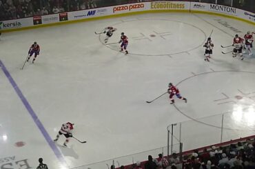Laval Rocket's Cayden Primeau stops Charlotte Checkers' MacKenzie Entwistle on a breakaway in game 2