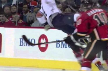Mark Giordano hipchecks Taylor Hall