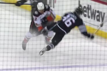 Sonny Milano throws a hit on Jack Hughes