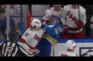 Jesperi Kotkaniemi fights Alexei Toropchenko after hitting Derek Stepan to the boards