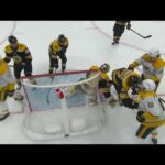 Yegor Afanasyev got crosschecked by Brad Marchand (28 mar 2023)