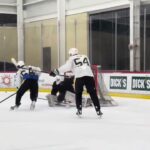Mikhail Ilyin runs drills in Penguins development camp