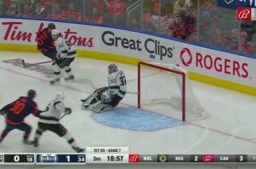 Jonathan Quick makes a save on a breaking Josh Archibald.