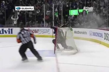 Erik Johnson saves the empty net
