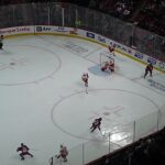 Detroit Red Wings' Cam Talbot makes a great glove save vs. Cole Caufield of the Montreal Canadiens