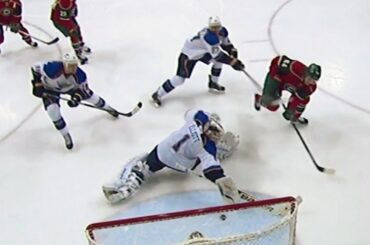 Elliott reaches back for acrobatic stick save