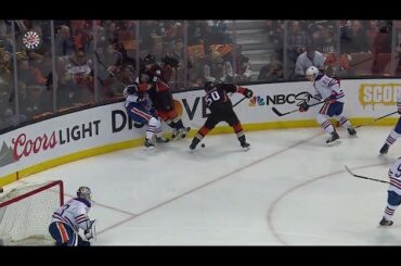Russell slow to get up after getting crunched by Ritchie along the boards