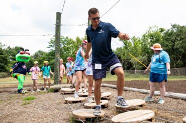New Low Ropes Course Encourages Girl Scouts to TAKE LEAPS! Cole Sillinger & Stinger Cut the Ribbon!