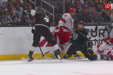 Jesper Fast falls on the leg of Vladislav Gavrikov after a cross-check from Matt Roy.