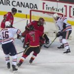 Oilers' Khaira squeaks one through the five-hole of Flames' Smith