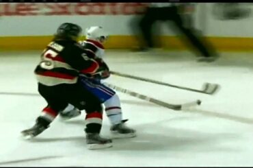 Funny - Erik Karlsson holds David Desharnais on the board. March 14th 2012