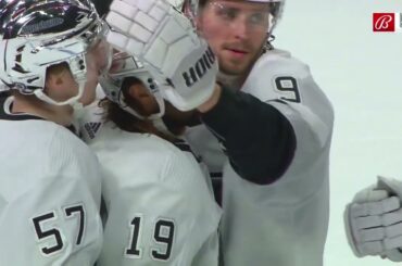 Alex Iafallo lobs a backhand shot from the neutral zone for the empty net goal.