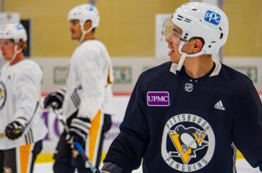 Penguins' Evan Rodrigues clowns around at practice during training camp