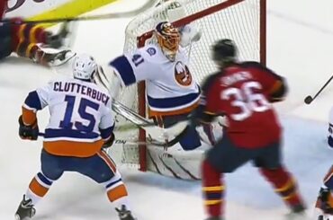 Halak pins puck on crossbar to rob Barkov