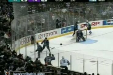 Joe Thornton vs Tim Gleason Dec 26, 2005