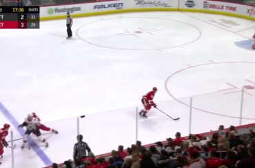 Niklas Kronwall runs over Rudolfs Balcers and fights Mark Stone
