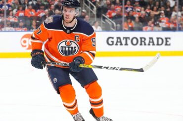 Connor McDavid sets up Benning to pick up his 100th point