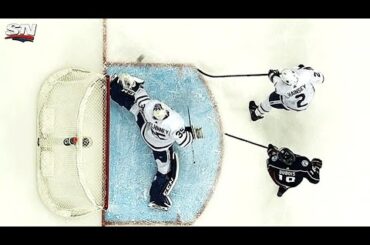 Maple Leafs’ McElhinney slides over, robs Alexander Wennberg with glove