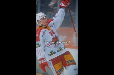EHCB Andersson outsmarted the goalie with style! 🕶️  #nationalleague #icehockey #shorts