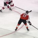 Travis Konecny scores a goal against the New Jersey Devils