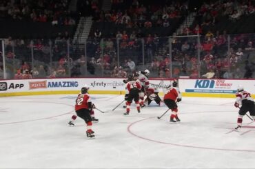 Kevin Rooney scores a goal against the Philadelphia Flyers